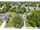 Aerial view of a home featuring a spacious backyard, mature trees, and a well-manicured lawn in a residential neighborhood at 17916 Racebrook Ct, Noblesville, IN 46062