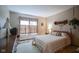 Cozy bedroom featuring a comfy bed and window with curtains at 17916 Racebrook Ct, Noblesville, IN 46062