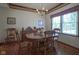 Traditional dining room with hardwood floors, classic furniture, and a chandelier at 17916 Racebrook Ct, Noblesville, IN 46062