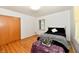 Bedroom features hardwood floors and a closet at 1910 Ivy Dr, Anderson, IN 46011