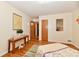 Bedroom with hardwood floors, neutral walls, and decor and a comfy twin bed at 1910 Ivy Dr, Anderson, IN 46011