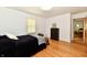 Bright bedroom featuring hardwood floors, and a window that brings in natural light at 1910 Ivy Dr, Anderson, IN 46011