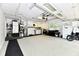 Large garage with laundry area, offering ample space for vehicles, storage, and projects at 1910 Ivy Dr, Anderson, IN 46011