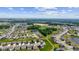 Aerial view of a new residential neighborhood with tree-lined streets, ponds, and green spaces at , Westfield, IN 46074