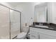 Modern bathroom with a shower, toilet, and vanity featuring a dark countertop at , Westfield, IN 46074