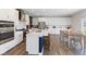 Modern kitchen boasts white cabinetry, stainless steel appliances, a center island, and eat in dining area at , Westfield, IN 46074