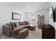 A cozy living room with modern furniture, carpeted floors and natural lighting at , Westfield, IN 46074