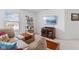 A cozy living room featuring a TV, book shelf, and comfortable sofa seating at , Westfield, IN 46074