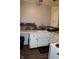 Functional kitchen with white cabinets and stainless steel sink at 2232 Fairview St, Anderson, IN 46016