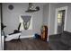 Bright living room featuring modern exercise equipment at 2232 Fairview St, Anderson, IN 46016