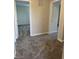 This bedroom features neutral walls, plush carpeting, and easy access to other rooms, creating a cozy and connected living space at 2540 Lullwater Ln, Indianapolis, IN 46229