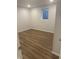 This finished bedroom space has hard surface floors and a window with a view at 2540 Lullwater Ln, Indianapolis, IN 46229