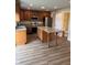 Spacious kitchen featuring granite countertops, stainless steel appliances, and a center island at 2540 Lullwater Ln, Indianapolis, IN 46229