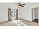 Bright bedroom with a ceiling fan, window with curtains, and neutral carpeting at 2614 Daylily Ct, Westfield, IN 46074