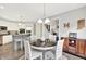 Dining Area that connects to Kitchen and a hallway with stairway at 2614 Daylily Ct, Westfield, IN 46074