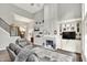 Cozy living room with tall ceilings, a fireplace, and comfortable seating at 2614 Daylily Ct, Westfield, IN 46074