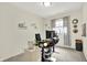 Home office featuring a modern desk, shelving, and a window with natural light at 2614 Daylily Ct, Westfield, IN 46074