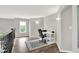 Office area with natural light boasts a white desk and chair perfect for remote work at 2614 Daylily Ct, Westfield, IN 46074