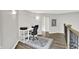 Cozy office space with dark wood floors, a white desk, and a comfortable black chair at 2614 Daylily Ct, Westfield, IN 46074