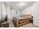 Neutral bedroom featuring a rustic wood bed frame, side tables, and carpeted floors at 2640 S Silcox Rd, Paragon, IN 46166