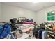 A messy bedroom with personal items and belongings scattered throughout the space at 2640 S Silcox Rd, Paragon, IN 46166