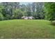 Large green lawn surrounds the property, providing ample space at 2640 S Silcox Rd, Paragon, IN 46166