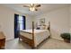 Cozy bedroom with four-poster bed, window, and natural light from window at 2747 Stonebridge Dr, Lebanon, IN 46052
