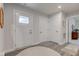 Bright and welcoming foyer with hardwood floors and neutral decor at 2747 Stonebridge Dr, Lebanon, IN 46052