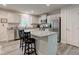 Modern kitchen featuring granite countertops, stainless steel appliances, and a breakfast bar at 2747 Stonebridge Dr, Lebanon, IN 46052