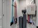 Functional utility room featuring a water heater and storage solutions at 2747 Stonebridge Dr, Lebanon, IN 46052
