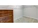 Walk-in closet with carpet flooring, metal shelving, and a wooden dresser at 2747 Stonebridge Dr, Lebanon, IN 46052