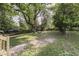 This property has a large backyard with mature trees at 2945 N Denny St, Indianapolis, IN 46218