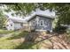 The backyard of this home with a new wooden deck at 2945 N Denny St, Indianapolis, IN 46218