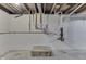 Unfinished basement with painted walls and exposed plumbing at 2945 N Denny St, Indianapolis, IN 46218