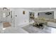 Open-concept living area with sleek marble flooring, modern decor, and seamless flow for entertaining at 3141 Citadel Ct, Indianapolis, IN 46268