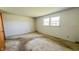A bedroom with a view of a double window at 3215 E 10Th St, Anderson, IN 46012