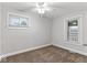 Comfortable bedroom featuring neutral walls, plush carpeting, and natural light at 3453 W 12Th St, Indianapolis, IN 46222