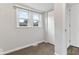 Freshly painted bedroom with closet, natural lighting, and new carpet give a clean aesthetic at 3453 W 12Th St, Indianapolis, IN 46222