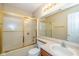 Bathroom with a shower/tub combo, a large mirror, and a vanity with sink and lighting at 3779 Crest Point Dr, Westfield, IN 46062