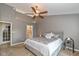 Serene bedroom with a ceiling fan and ample natural light, creating a cozy retreat at 3779 Crest Point Dr, Westfield, IN 46062