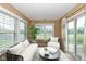 Inviting sunroom filled with natural light, perfect for relaxation and entertaining at 3779 Crest Point Dr, Westfield, IN 46062