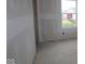 Unfinished bedroom features a single window overlooking the exterior of the home at 4055 Bozeman Way, Bargersville, IN 46106