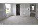 Unfinished bedroom features natural light and multiple entryways at 4055 Bozeman Way, Bargersville, IN 46106