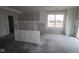 Unfinished living room features natural light and a window overlooking the exterior at 4055 Bozeman Way, Bargersville, IN 46106