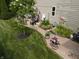 This backyard features a well-kept lawn and a variety of garden decor at 4232 Parliament Way, Avon, IN 46123