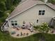This backyard features a well-kept lawn and a variety of garden decor at 4232 Parliament Way, Avon, IN 46123