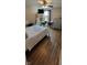 Bedroom features wood floor, large window and neutral walls at 4232 Parliament Way, Avon, IN 46123