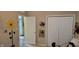A bedroom has a double closet and sunflower wall decoration at 4232 Parliament Way, Avon, IN 46123
