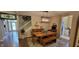 Bright dining area with a rustic table, chandelier lighting, and laminate flooring at 4232 Parliament Way, Avon, IN 46123