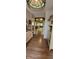 Open foyer featuring beautiful flooring, with clear view into main living area at 4232 Parliament Way, Avon, IN 46123